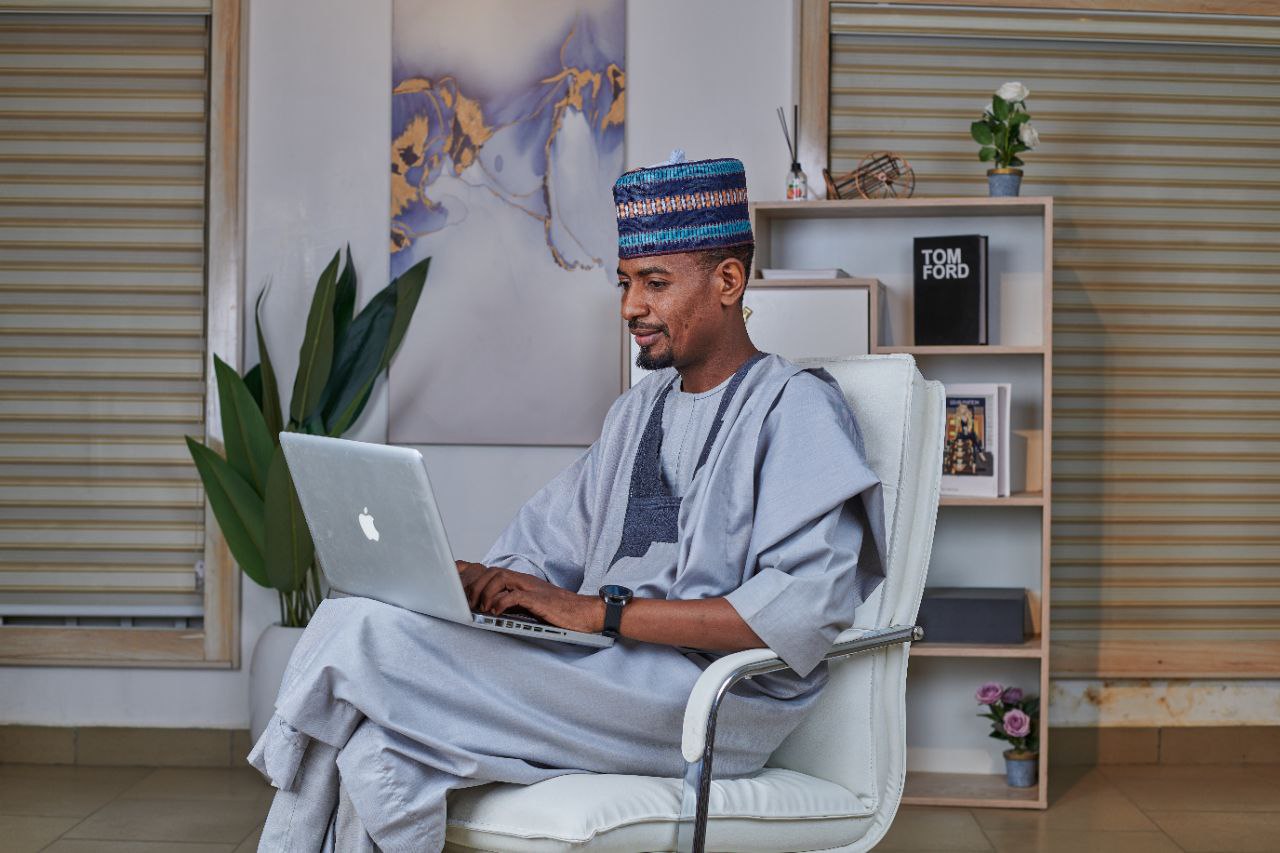 Man working on laptop with big vision
