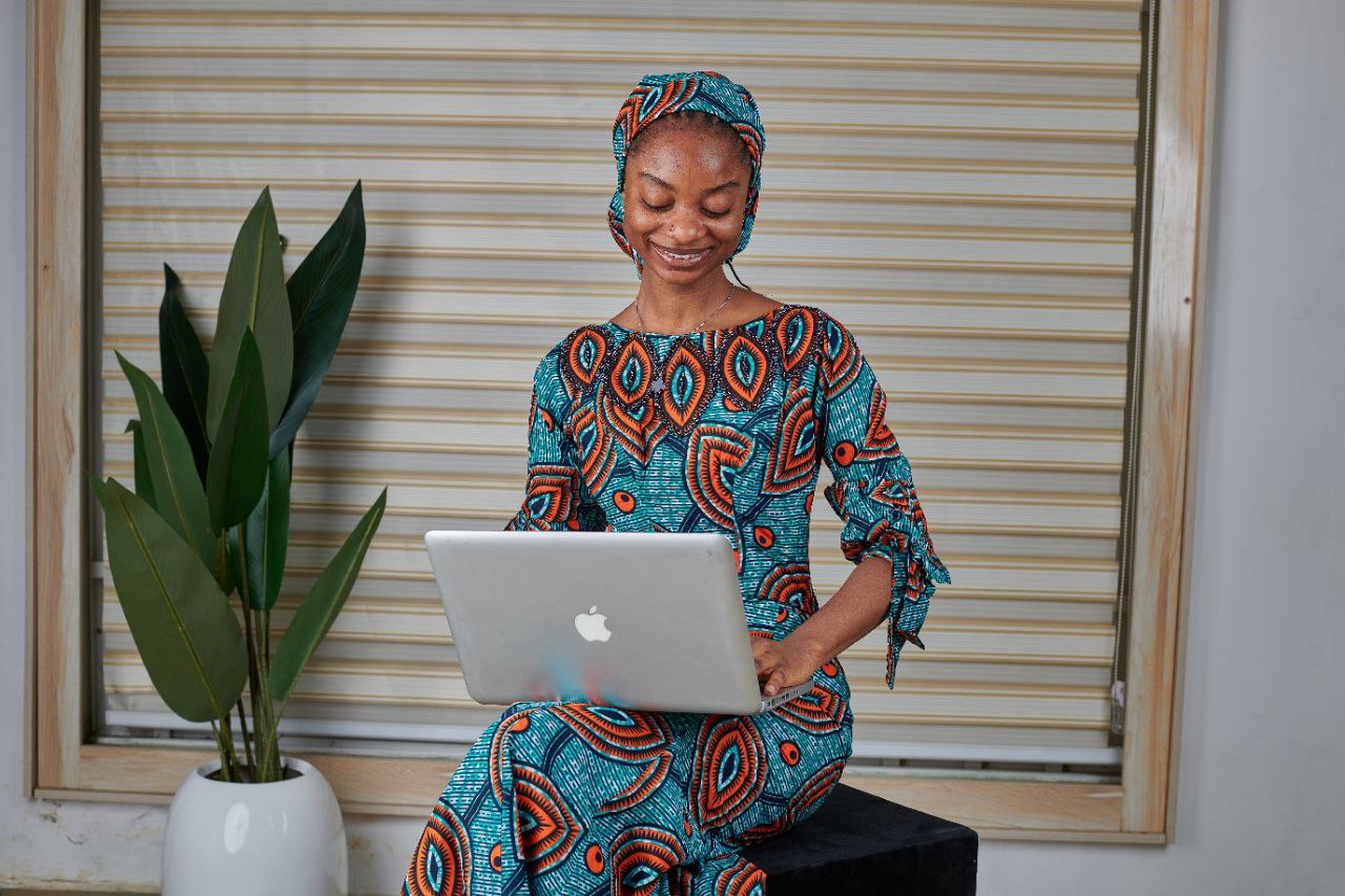 Woman working on Mac showing urgency and opportunity